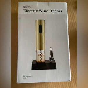 New in box Secura electric wine bottle opener